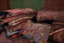 Load image into Gallery viewer, colorful Paisley textiles, folded.