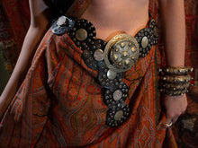Load image into Gallery viewer, Model wearing leather belt featuring antique Moroccan silver coins