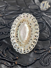 Load image into Gallery viewer, Closeup of intricately carved mother-of-pearl ring.
