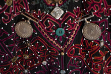 Load image into Gallery viewer, Closeup vew of coin, bead, and distinctive embroidery on Kohistani tunic.