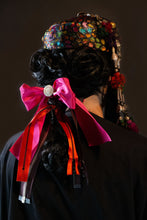 Load image into Gallery viewer, Back view of Upcycled vintage pillbox hat maximalized with heirloom mother-of-pearl buttons, silver Afghan clothing ornaments, antique Pashtun silver triangular ornaments and Afghani tent band tassels with silver.
