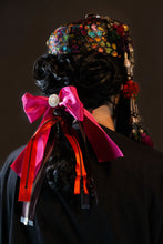 Load image into Gallery viewer, Back view of Upcycled vintage pillbox hat maximalized with heirloom mother-of-pearl buttons, silver Afghan clothing ornaments, antique Pashtun silver triangular ornaments and Afghani tent band tassels with silver.