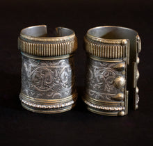 Load image into Gallery viewer, Pair of brass and silver Swat Valley cufs showing detail work
