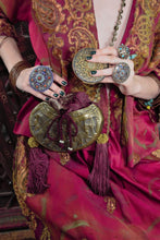 Load image into Gallery viewer, Sufi Kashkul evening bag, shown on model.
