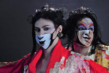 Load image into Gallery viewer, Two masks on models: porcelain geisha and Noh character