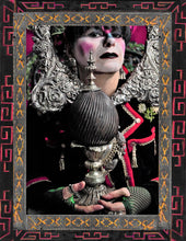 Load image into Gallery viewer, Model holding carved stone "egg" mounted on a detailed metal stand.