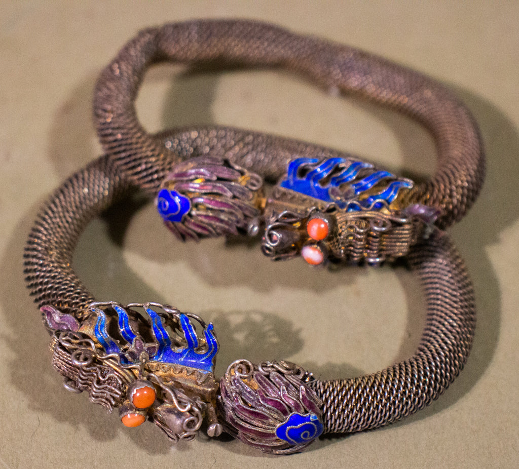 Pair of Antique Chinese Dragon Bracelets with Coral Eyes