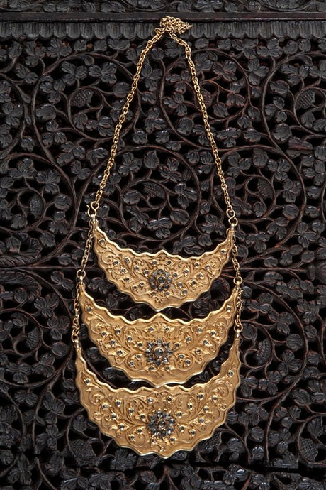 Front view of stunning 3-tiered gold necklace 