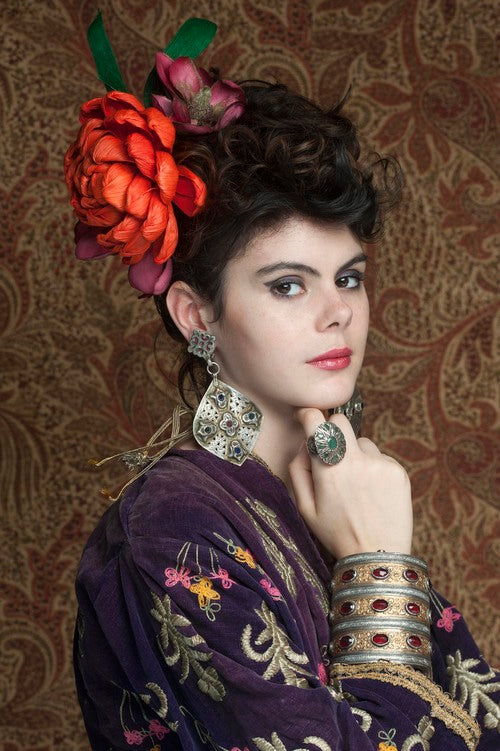 Portrait of model wearing Ottoman velvet jacket.