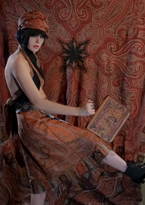 Model in vintage paisley skirt