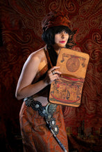 Load image into Gallery viewer, Model peeks into vintage embossed leather Egyptian handbag.
