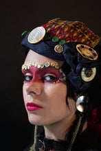 Load image into Gallery viewer, Fascinator created with embroidered Indus Kohistan textile, heirloom mother-of-pearl buttons, Swat carved antique mother-of-pearl button,  and Central Asian silver.

