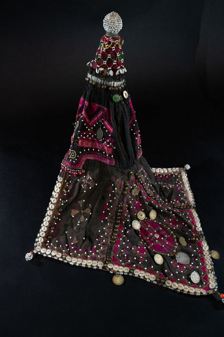 Kohistani headdress with silk embroidery, buttons, coins.