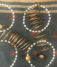 Load image into Gallery viewer, Angami Nagaland bracelets, brass coild on background
