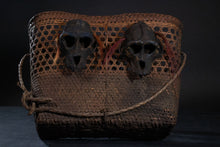 Load image into Gallery viewer, Side view of Naga headtaker&#39;s basket with simian skulls
