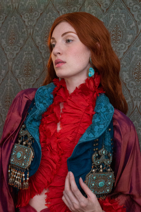 Front view showing lace overlay on velvet cowl collar