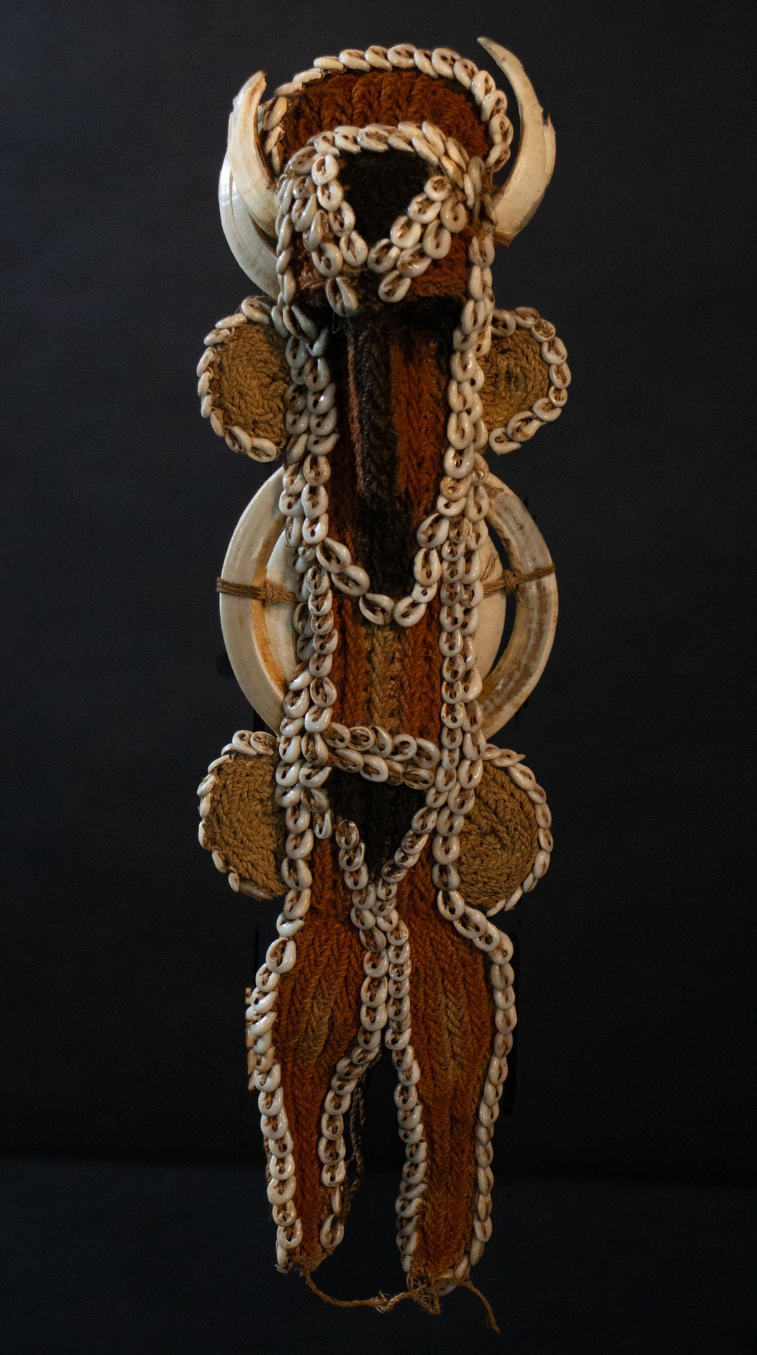 Woven Initiation Ornament with sewn-on cowrie shells. Maprik region, Papua New Guinea.