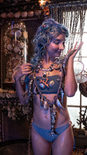 Load image into Gallery viewer, Model adorned in abalone and pearl necklace, in shell grotto.
