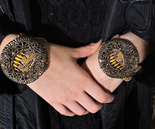 Load image into Gallery viewer, pair of 18th century Pyrite buckles on silk Italian woven ribbon with bronze clasps designed to be worn as bracelets, created by Linda Pastorino.
