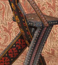 Load image into Gallery viewer, Detail of the chair center showing the three legs crossing at the chair seat.
