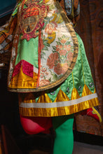 Load image into Gallery viewer, Detail of silk brocade and grommeted skirt and chasuble for jester&#39;s outfit.
