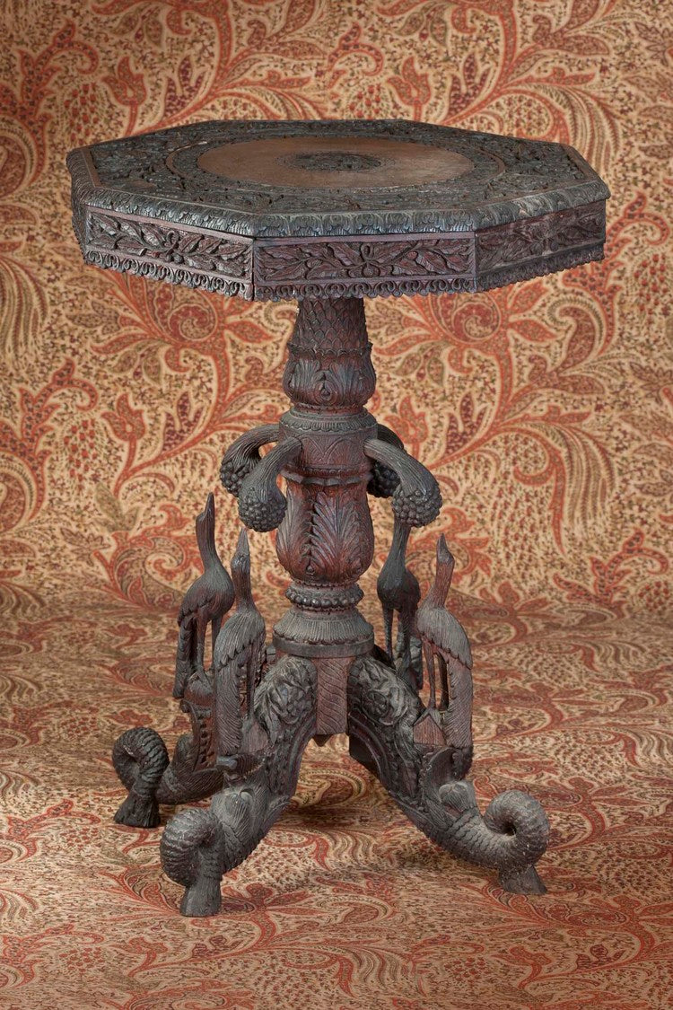 Intricately carved antique teak table from India