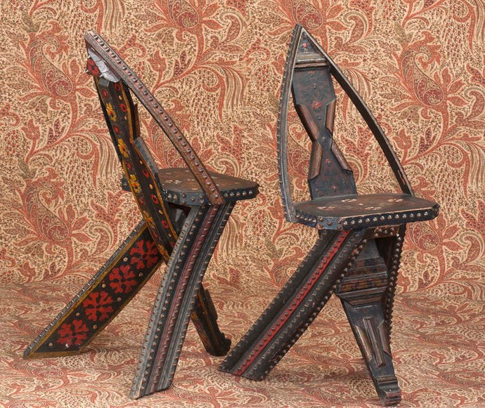 Pair of three-legged Russian chairs from Orientalist period. Laquer design with metal studs.